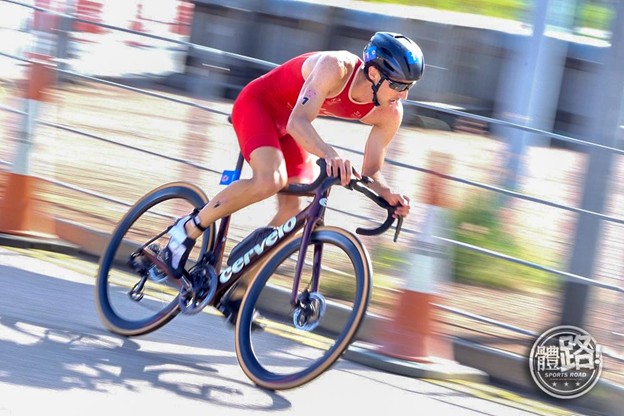 A person riding a bicycleDescription automatically generated